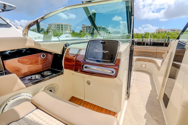 Slide: The Image of 2023 Chris-Craft Launch 31 GT interior with luxurious wood and leather accents. - 16