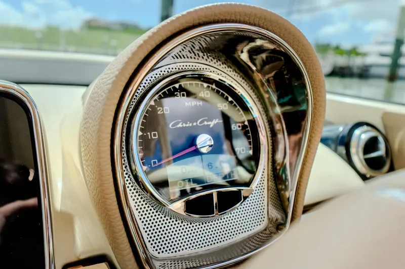 Slide: The Image of Close-up of 2023 Chris-Craft Launch 31 GT speedometer, showcasing elegant design and craftsmanship. - 20