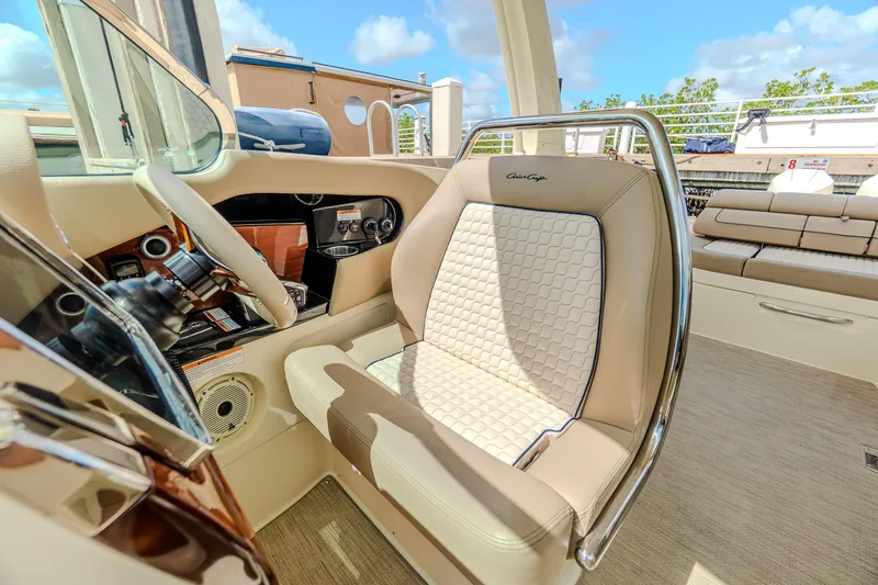 Slide: The Image of 2023 Chris-Craft Launch 31 GT helm with luxurious seating and modern controls. - 25