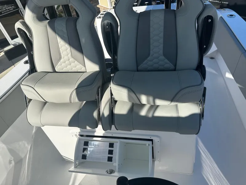 Slide: The Image of 2025 Cape Horn 28XS boat seats with storage compartment, featuring modern design and comfort. - 20