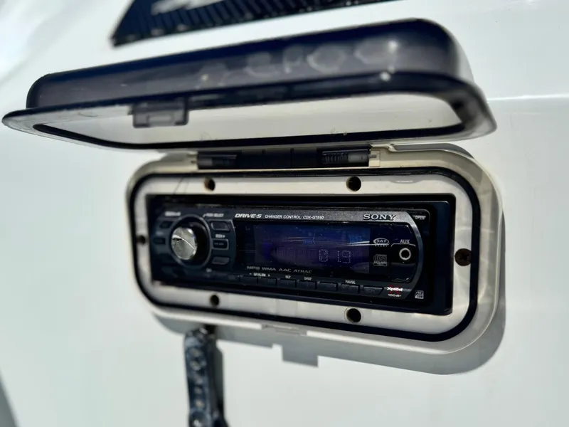 Slide: The Image of Sony stereo system in a 2007 Baja 26 Outlaw boat, mounted with protective cover. - 17