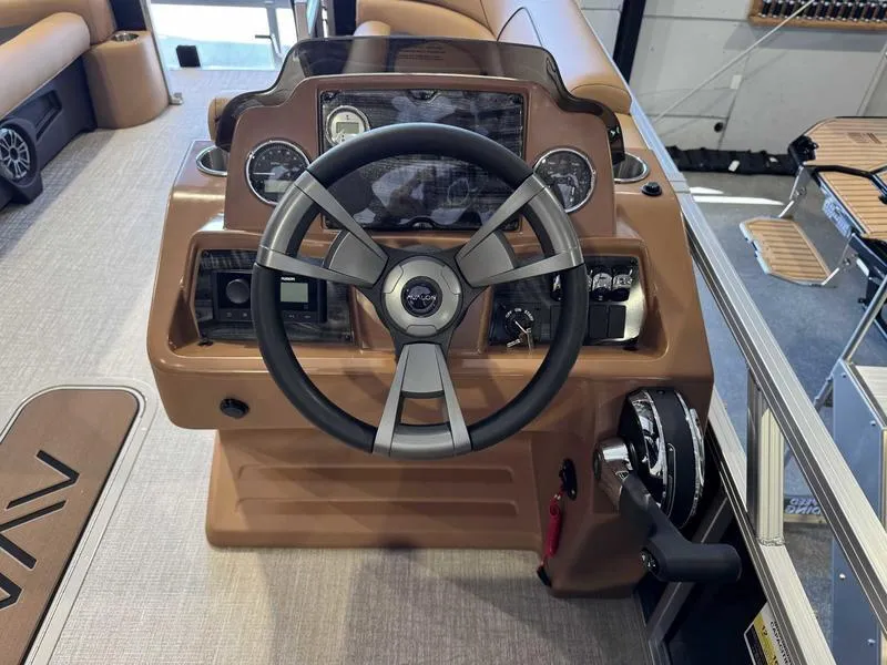 Slide: The Image of Steering console of 2025 Avalon 2385 25 Venture QL boat, featuring modern controls and dashboard. - 8