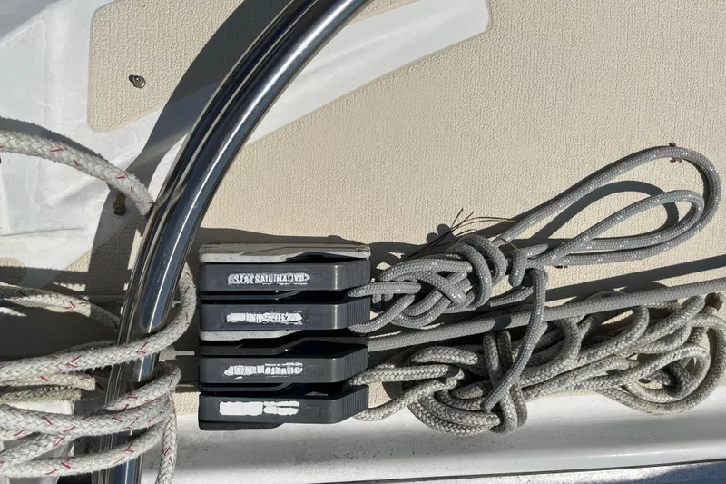 Slide: The Image of Rope and cleat setup on a 1988 Tartan 31 sailboat deck. - 25