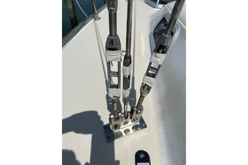Slide: The Image of Close-up of rigging hardware on a 1988 Tartan 31 sailboat deck. - 34