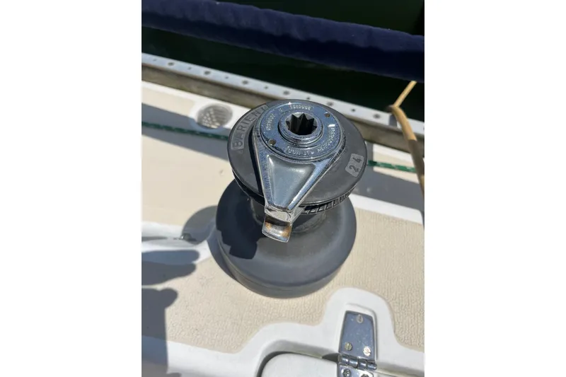 Slide: The Image of Winch on 1988 Tartan 31 sailboat deck, featuring a Barient 24 model. - 35