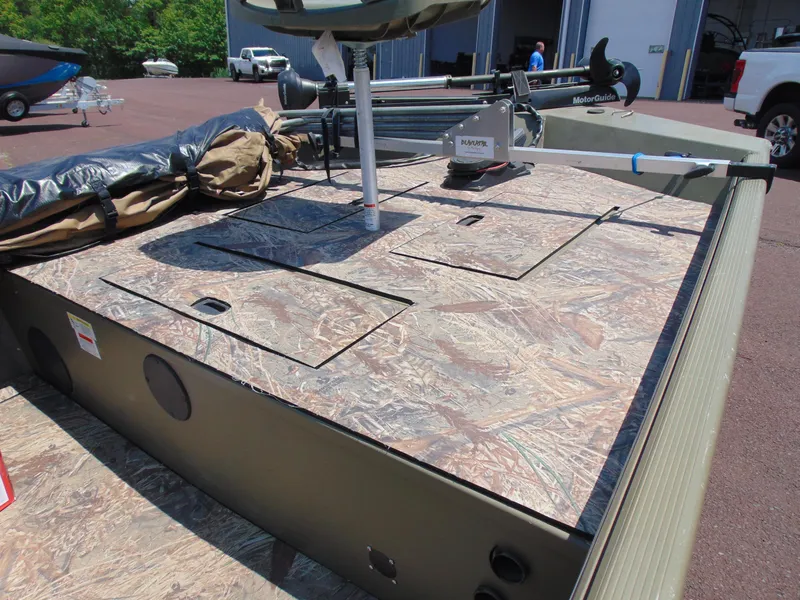 Slide: The Image of 2016 Crestliner 1860 Retriever Jon Deluxe boat with camo deck and MotorGuide trolling motor. - 10