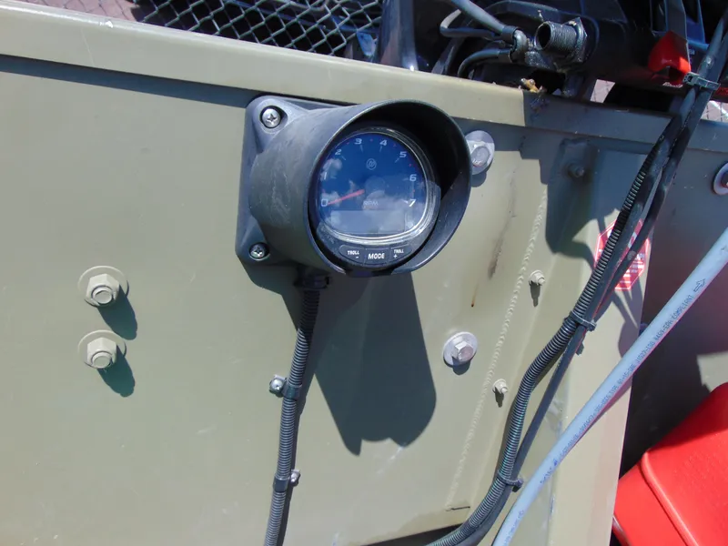 Slide: The Image of Instrument panel of 2016 Crestliner 1860 Retriever Jon Deluxe boat. - 9