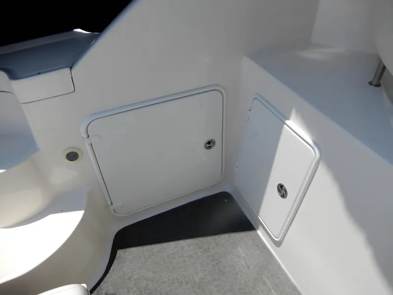 Slide: The Image of 2006 Regal Commodore 3760 IO boat interior storage compartments. - 10