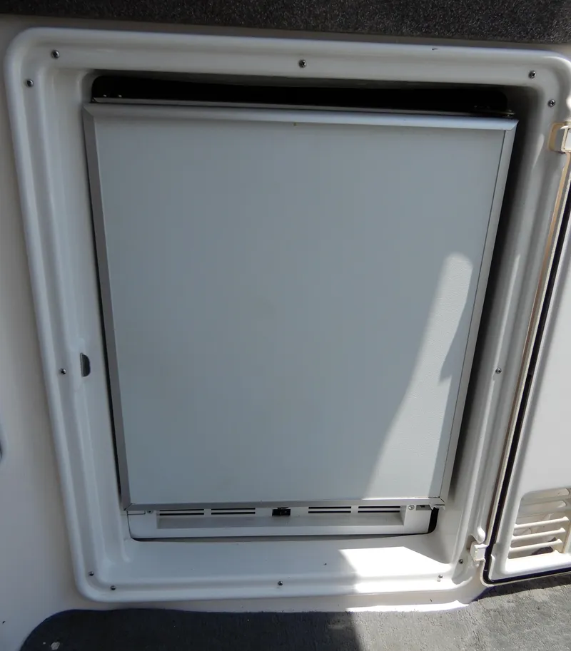 Slide: The Image of Built-in refrigerator on 2006 Regal Commodore 3760 IO boat. - 12