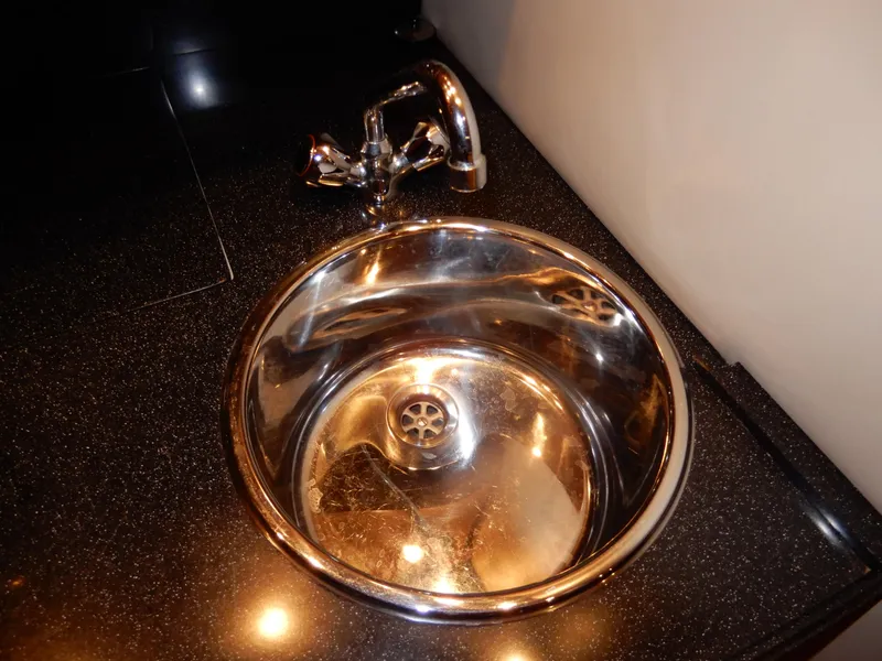 Slide: The Image of Stainless steel sink in 2006 Regal Commodore 3760 IO yacht kitchen. - 36