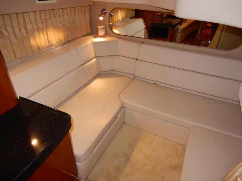 Slide: The Image of Interior of 2006 Regal Commodore 3760 IO yacht with beige seating and elegant lighting. - 46
