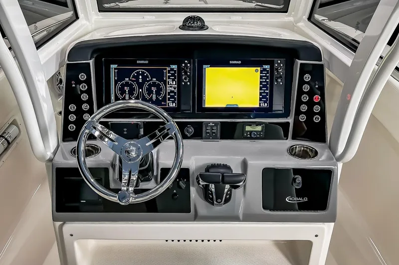 Slide: The Image of 2026 Robalo R270 Center Console storage compartment with latch and speaker. - 9