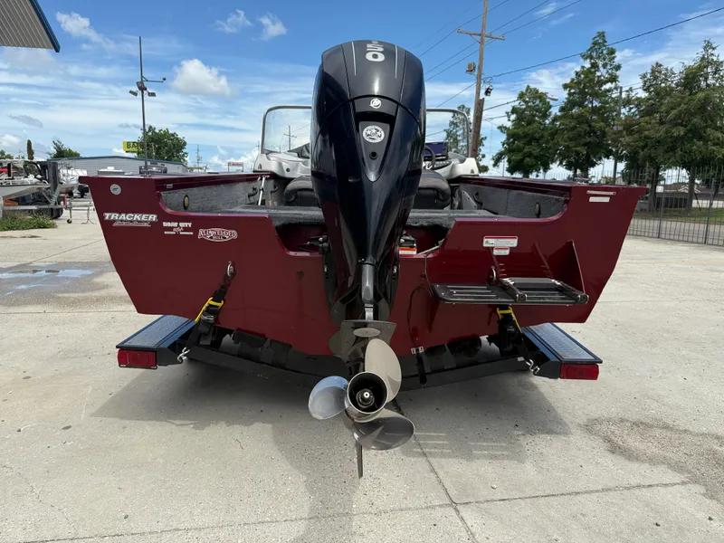 Slide: The Image of 2015 Tracker Targa V18 Combo boat with Mercury engine on trailer. - 6