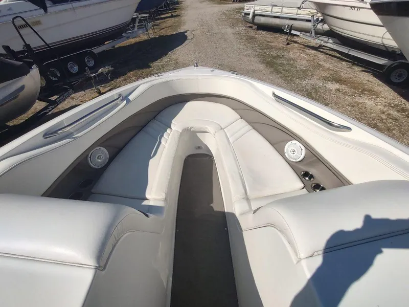 Slide: The Image of Cobalt 262 boat interior, 2000 model, featuring white seating and speakers. - 3