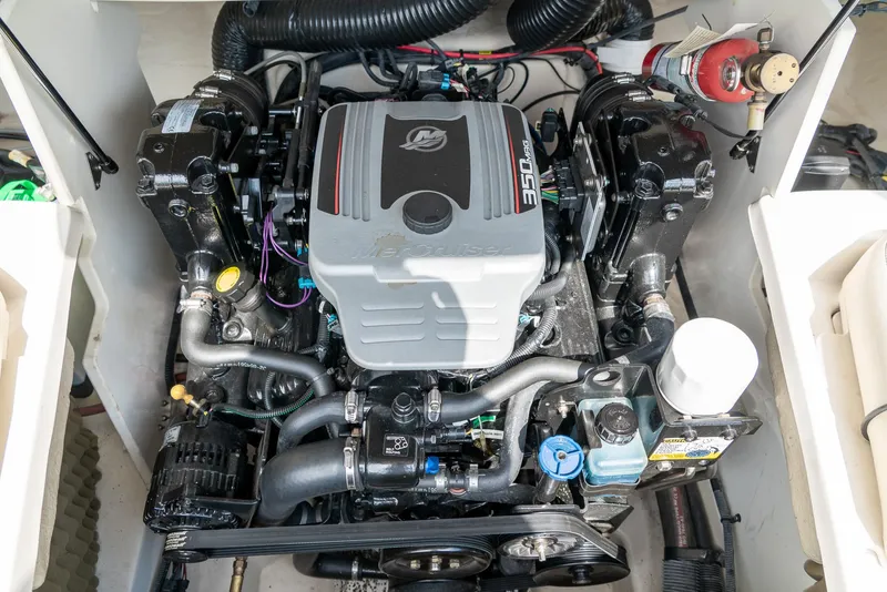 Slide: The Image of Engine of 2009 Sea Ray 210 Select boat, showcasing detailed components and layout. - 21