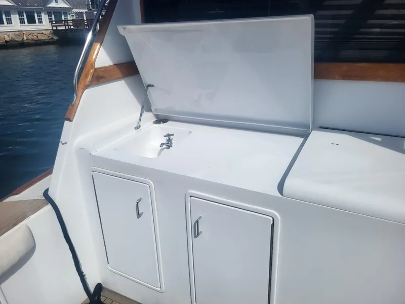 Slide: The Image of 1989 Ocean Yachts 48 boat sink and storage area on deck. - 22