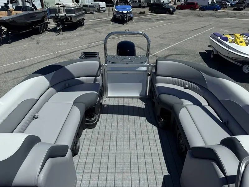Slide: The Image of 2025 Avalon 2385 25 LSZ QL pontoon boat interior with gray seating and helm. - 10