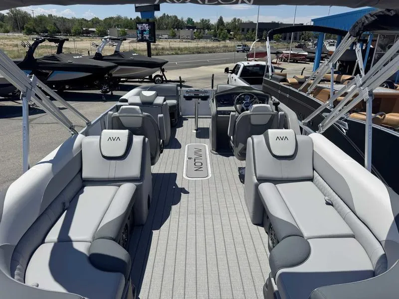 Slide: The Image of Luxurious 2025 Avalon 2385 25 LSZ QL pontoon boat with spacious seating and modern design. - 4