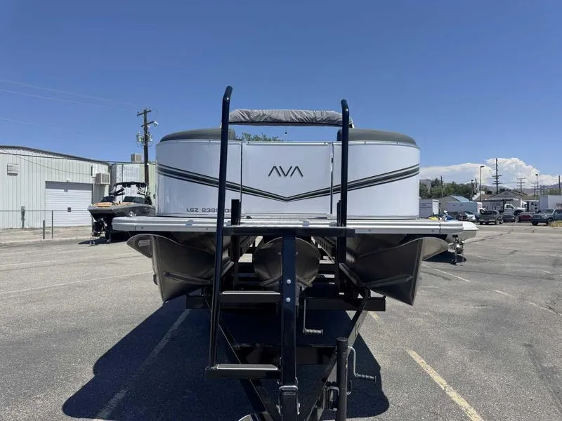Slide: The Image of 2025 Avalon 2385 25 LSZ QL pontoon boat on trailer in parking lot. - 5
