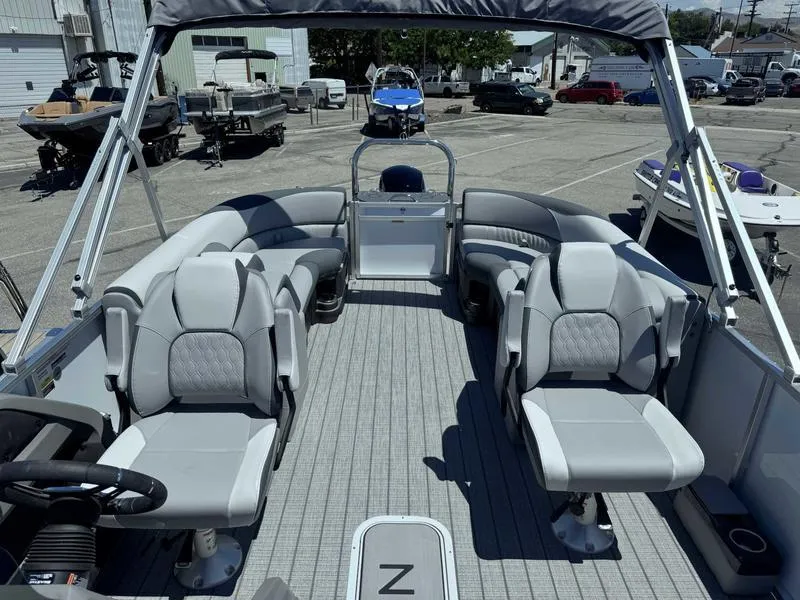 Slide: The Image of 2025 Avalon 2385 25 LSZ QL pontoon boat with spacious seating and modern design. - 9