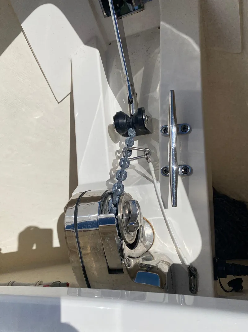 Slide: The Image of Anchor winch and cleat on 2021 Tiara Yachts 38LX deck. - 31