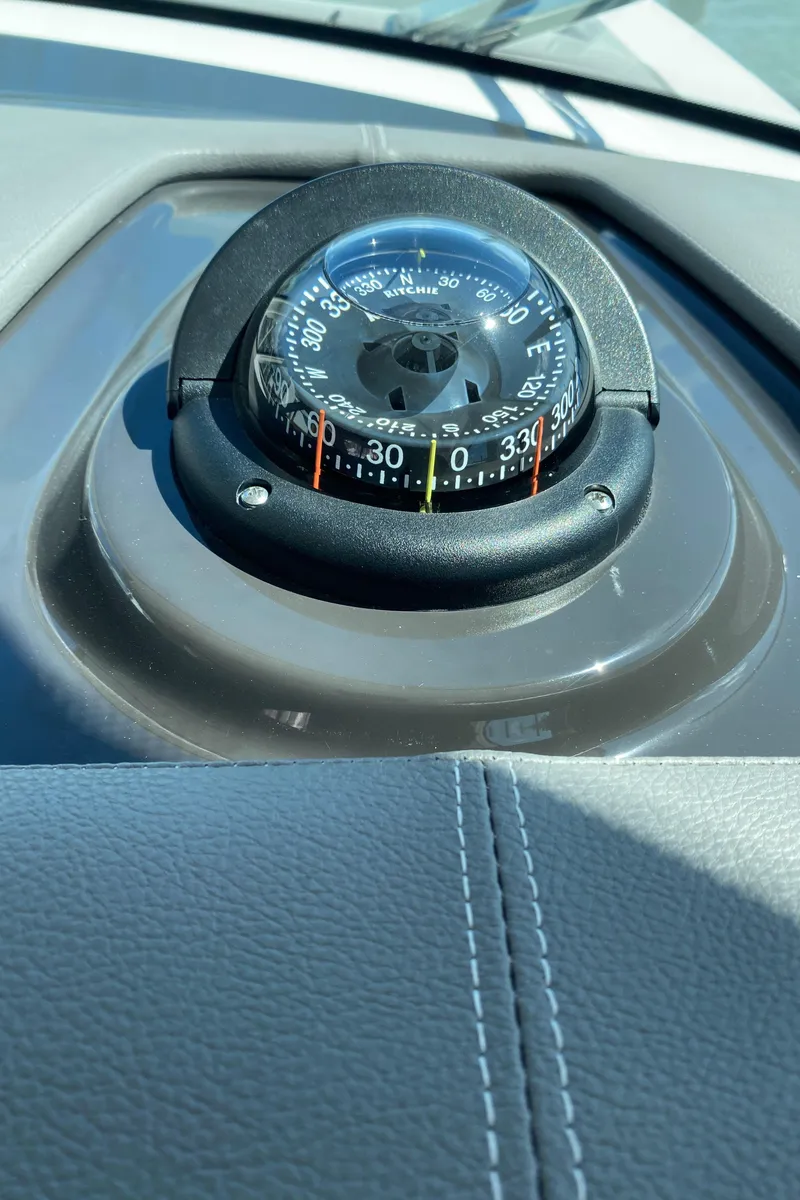 Slide: The Image of Compass on 2021 Tiara Yachts 38LX dashboard, displaying navigation directions. - 33