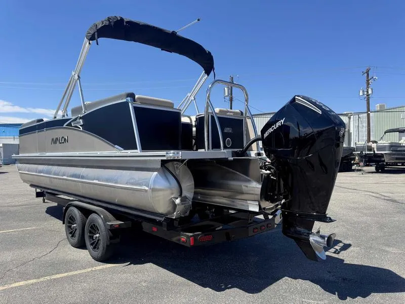 Slide: The Image of 2025 Avalon 2385 25 Catalina QL pontoon boat with Mercury outboard motor on trailer. - 3