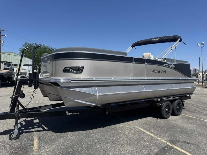 Slide: The Image of 2025 Avalon 2385 25 Catalina QL pontoon boat on trailer in parking lot. - 5
