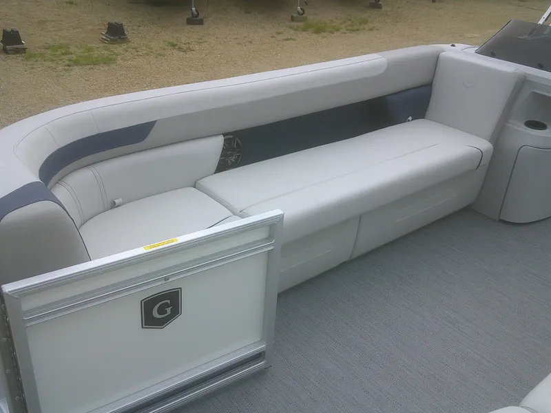 Slide: The Image of 2026 Godfrey 2286 Sweetwater Cruise Special Edition boat interior with plush seating. - 5