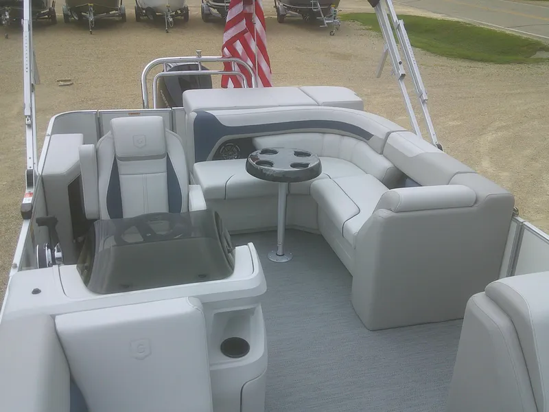 Slide: The Image of 2026 Godfrey 2286 Sweetwater Cruise Special Edition pontoon boat interior with plush seating. - 8