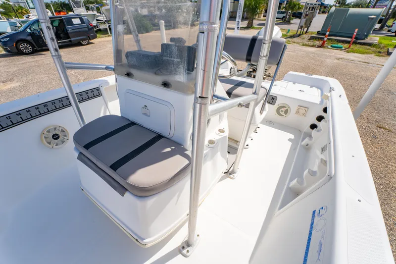 Slide: The Image of 2008 Sea Chaser 170 Bay Runner boat interior with seating and console. - 19