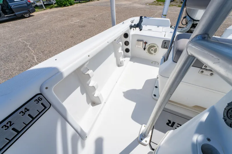 Slide: The Image of 2008 Sea Chaser 170 Bay Runner boat interior with rod holders and seating. - 20