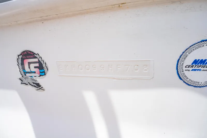 Slide: The Image of Close-up of 2008 Sea Chaser 170 Bay Runner hull with certification stickers. - 22