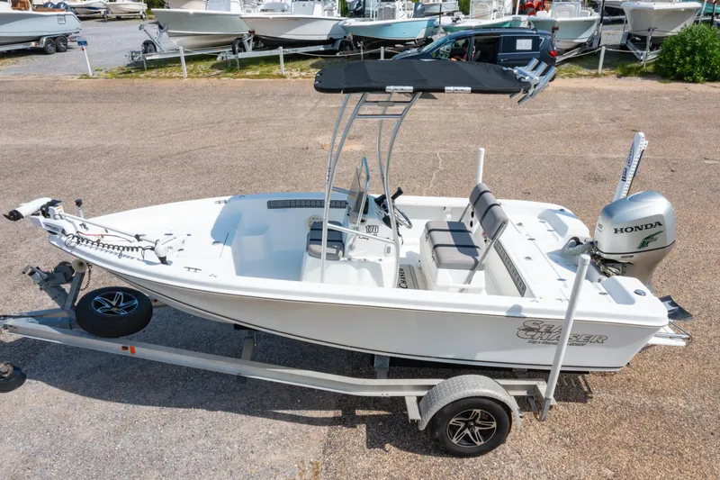 Slide: The Image of 2008 Sea Chaser 170 Bay Runner boat on trailer with Honda outboard motor. - 24