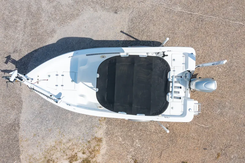 Slide: The Image of Aerial view of a 2008 Sea Chaser 170 Bay Runner boat on a gravel surface. - 25
