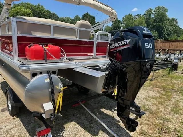 Slide: The Image of 2024 Sun Tracker Bass Buggy 16 XL Select pontoon boat with Mercury 50 outboard motor. - 4