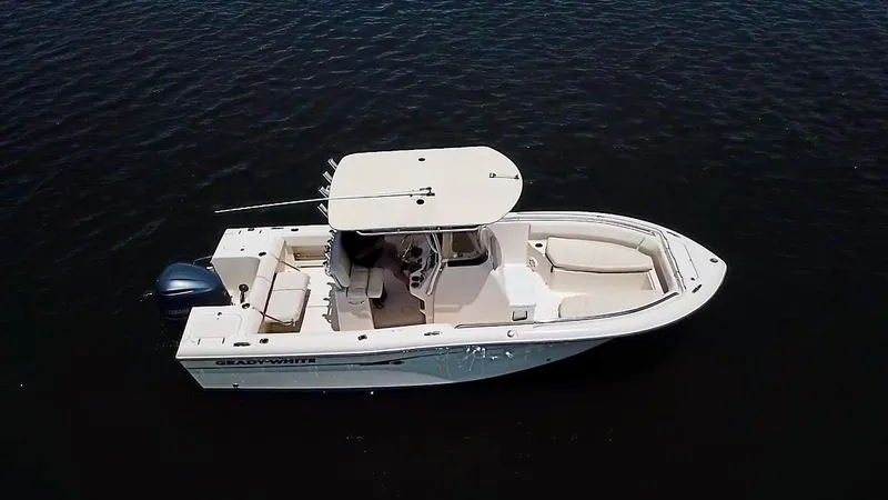 Slide: The Image of 2012 Grady-White Fisherman 230 boat on calm water, aerial view. - 4