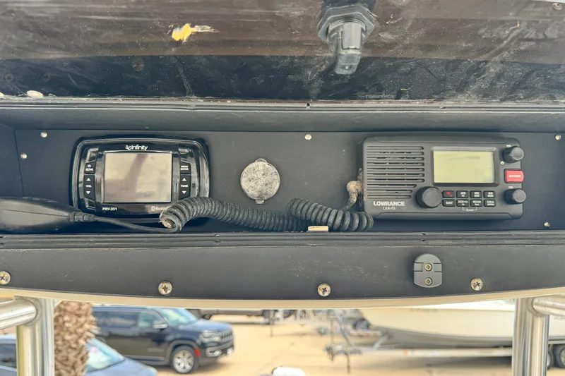 Slide: The Image of 2016 Ranger 2510 Bay Ranger dashboard with Infinity and Lowrance marine electronics. - 8