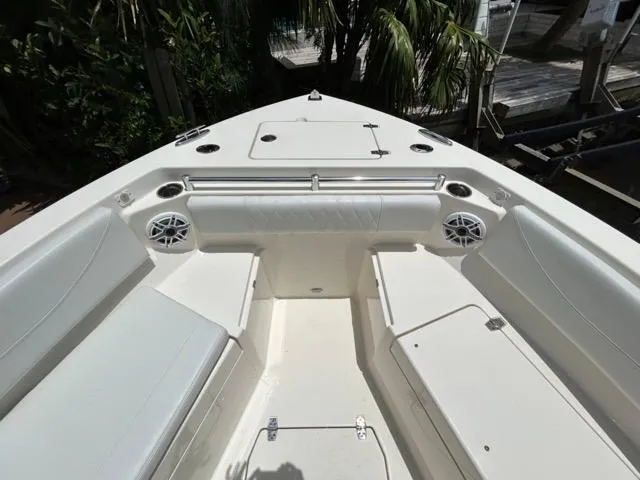 Slide: The Image of 2022 Cobia 240 Center Console boat dashboard with Garmin navigation system. - 13