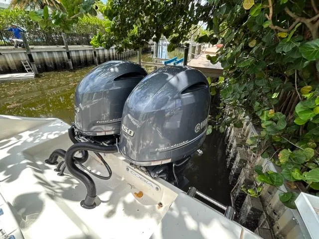 Slide: The Image of 2022 Cobia 240 Center Console boat interior with seating and speakers. - 14