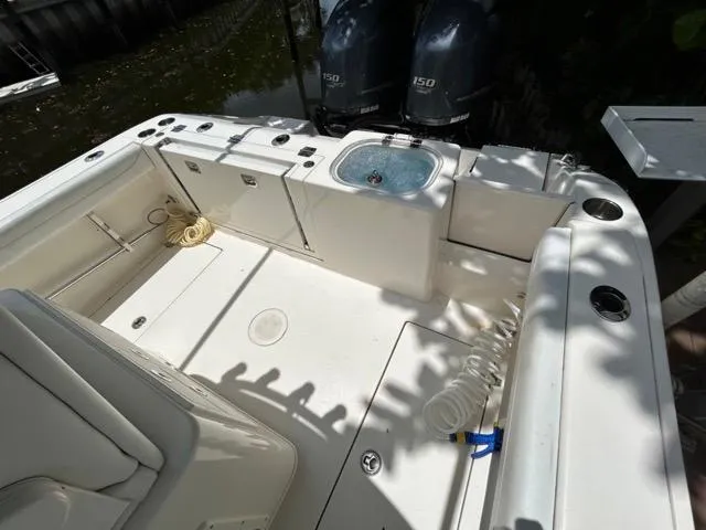 Slide: The Image of 2022 Cobia 240 Center Console boat dashboard with Garmin navigation system. - 16