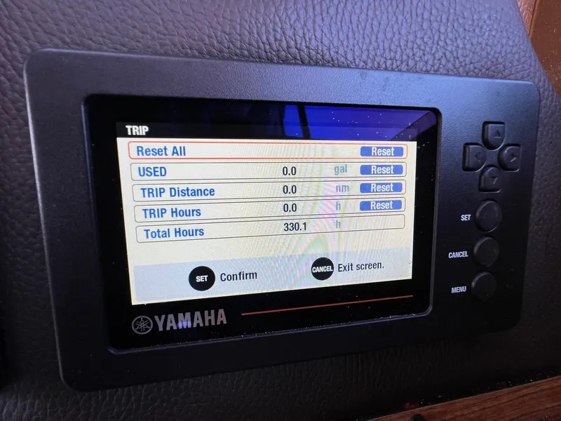 Slide: The Image of Yamaha display on 2018 Ranger Tugs R23 showing trip and total hours. - 20