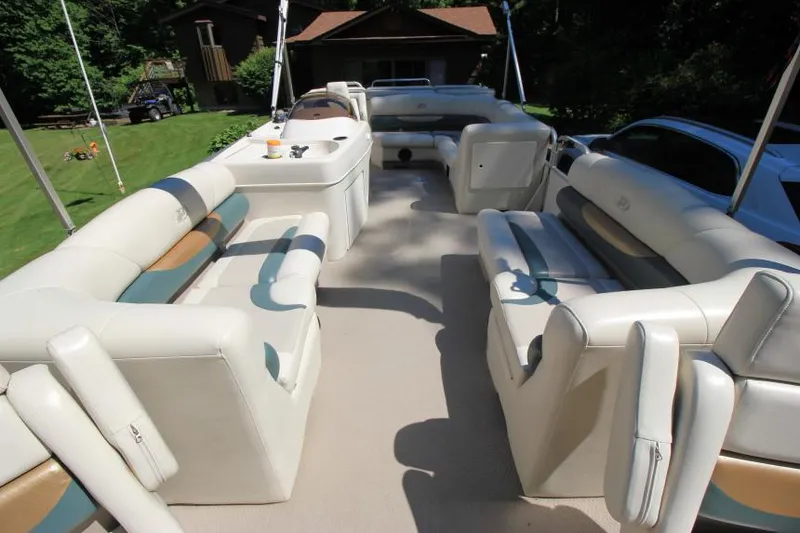 Slide: The Image of 2002 Princecraft Versailles 22 SS pontoon boat with spacious seating and outdoor setting. - 10