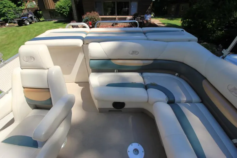 Slide: The Image of 2002 Princecraft Versailles 22 SS boat interior with plush seating and spacious layout. - 18