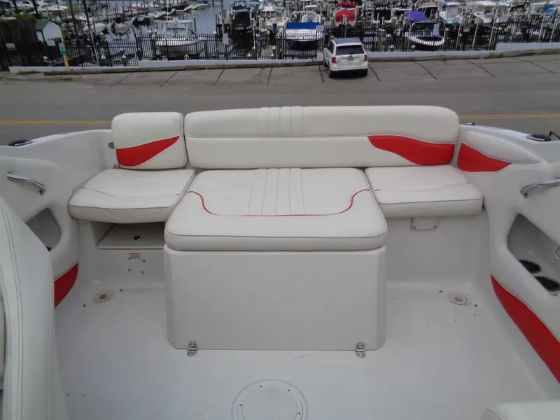 Slide: The Image of 2006 Crownline 220 CCR boat interior with white and red seating. - 17