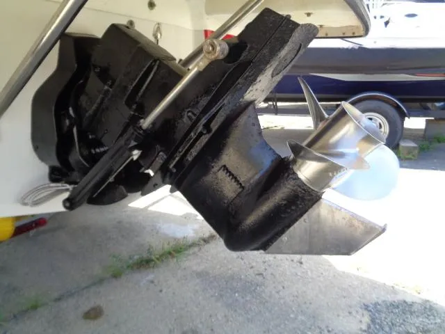 Slide: The Image of Outboard motor of a 2006 Crownline 220 CCR boat, showing propeller and drive system. - 27