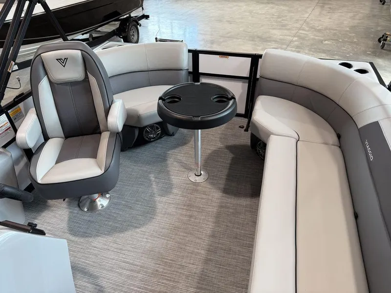 Slide: The Image of 2026 Viaggio V16U boat interior with gray seating, round table, and modern design. - 7