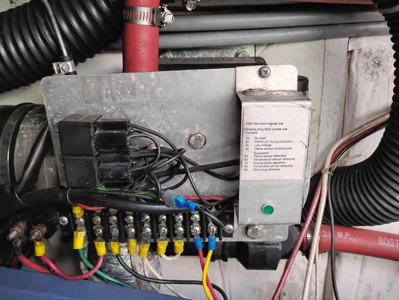 Slide: The Image of Electrical panel with wiring and diagnostic guide in a 1997 Bayliner 4087 Aft Cabin Motoryacht. - 45