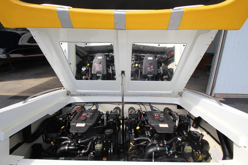 Slide: The Image of 2008 Formula 292 FASTech engine compartment with dual engines and open hatch. - 22