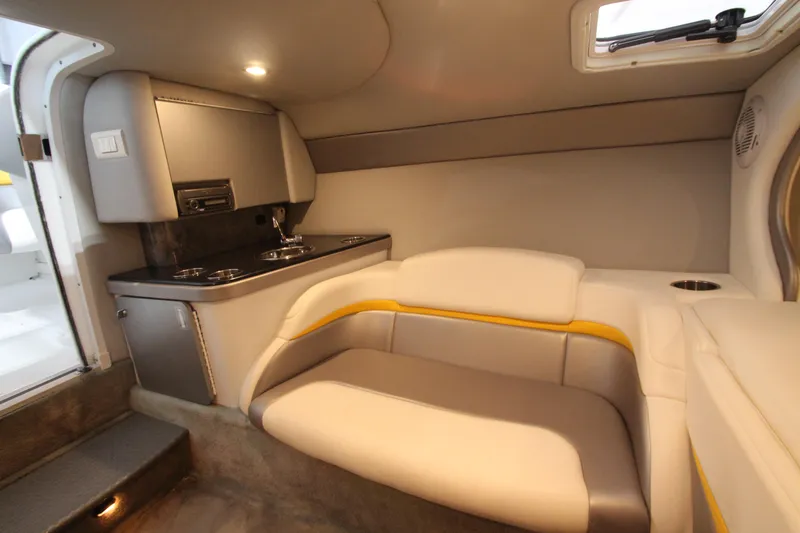 Slide: The Image of 2008 Formula 292 FASTech cabin interior with seating and kitchenette. - 28